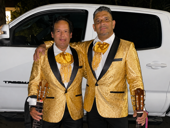 trio musicians in gold suits