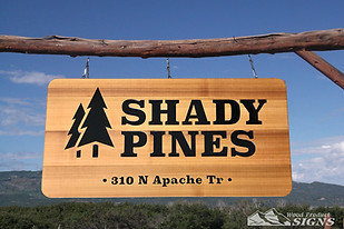 sign with a forest on the background
