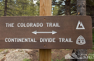 sign with a forest on the background