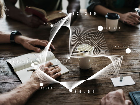 Team meeting analyzing data, overlaid with abstract digital analytics graph lines and numerical data points