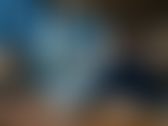 A student interacts with a holographic screen labeled "Oakhaven High School—AI Branding Assistant" in a library setting, focused and engaged.