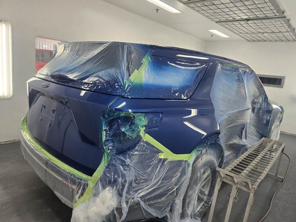 SUV masked and painted in the booth