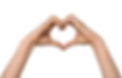 Woman making heart with her hands on white background.jpg