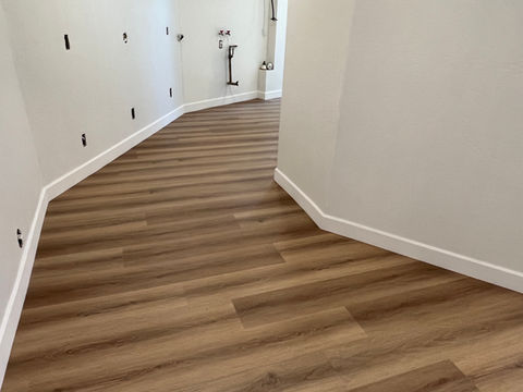 Hallway remodel featuring wood-look luxury vinyl plank flooring by Apflooringsd.