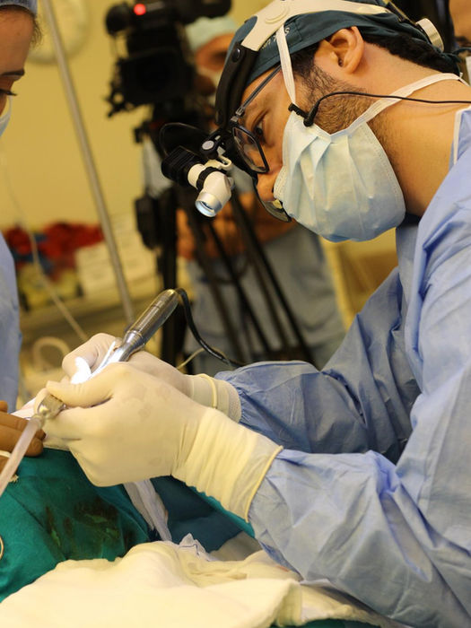 Prof. Dr. Suleyman Tas performing rhinoplasty surgery with surgical precision