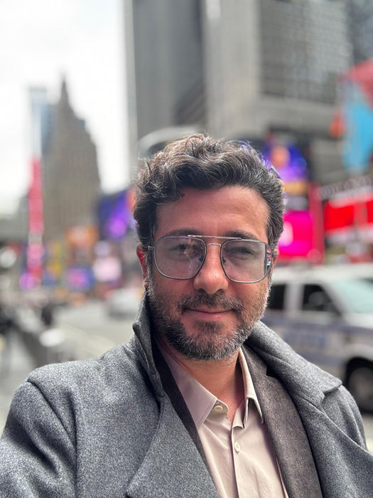 Prof. Dr. Suleyman Tas in a modern city setting