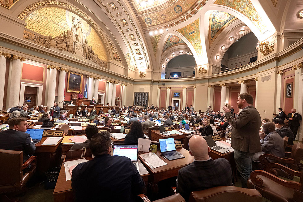 Rep. Zack Stephenson (DFL-Coon Rapids) explains his amendment to the members during debate on HF14. The amendment failed 67-66.