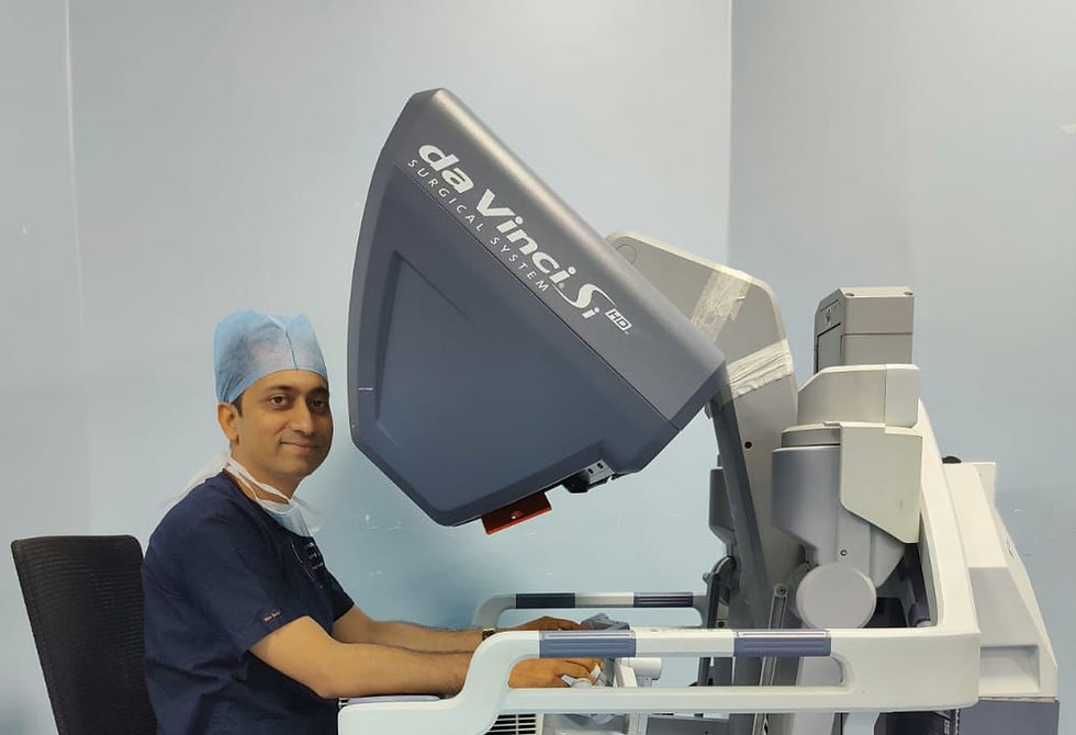 Dr. Soumen Roy with a Robotic Arm used in Robotic Surgery in Apollo Hospital