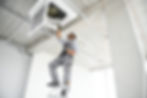 ac-electrician-technician-repairing-air-conditioner-appliance.jpg
