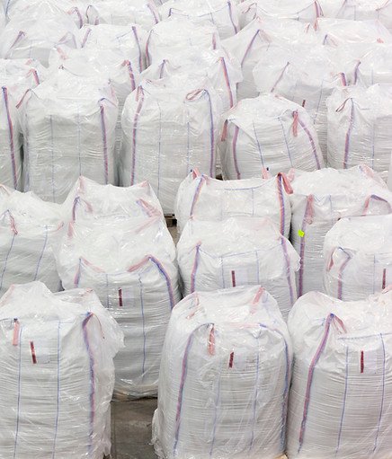 portrait-of-businessman-standing-among-large-bags-2026-01-11-09-41-54-utc.jpg