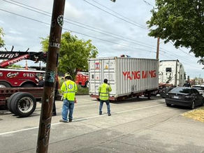 A shipping container blocked Corson Avenue S for about an hour