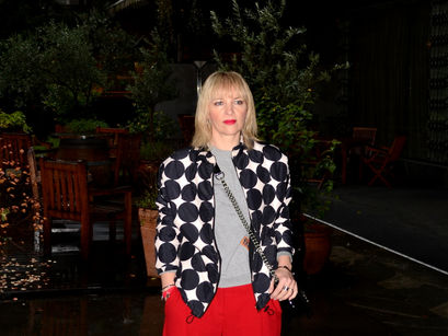 Red pants, rain & sunglasses