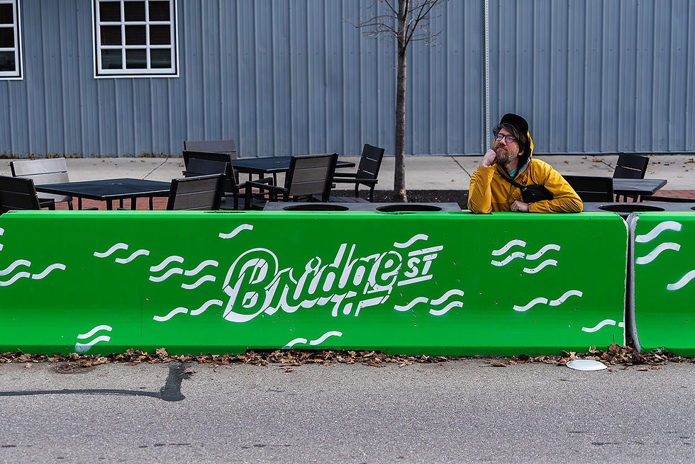 Dave Battjes behind a stenciled barricade