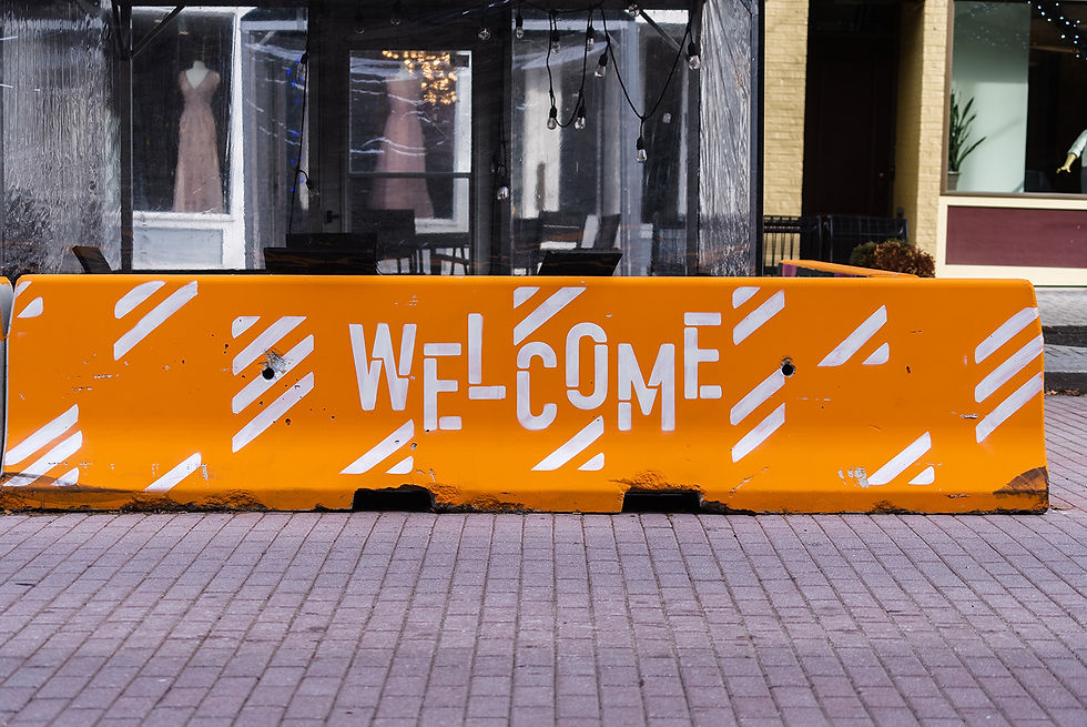 Welcome painted on barricade in Grand Rapids