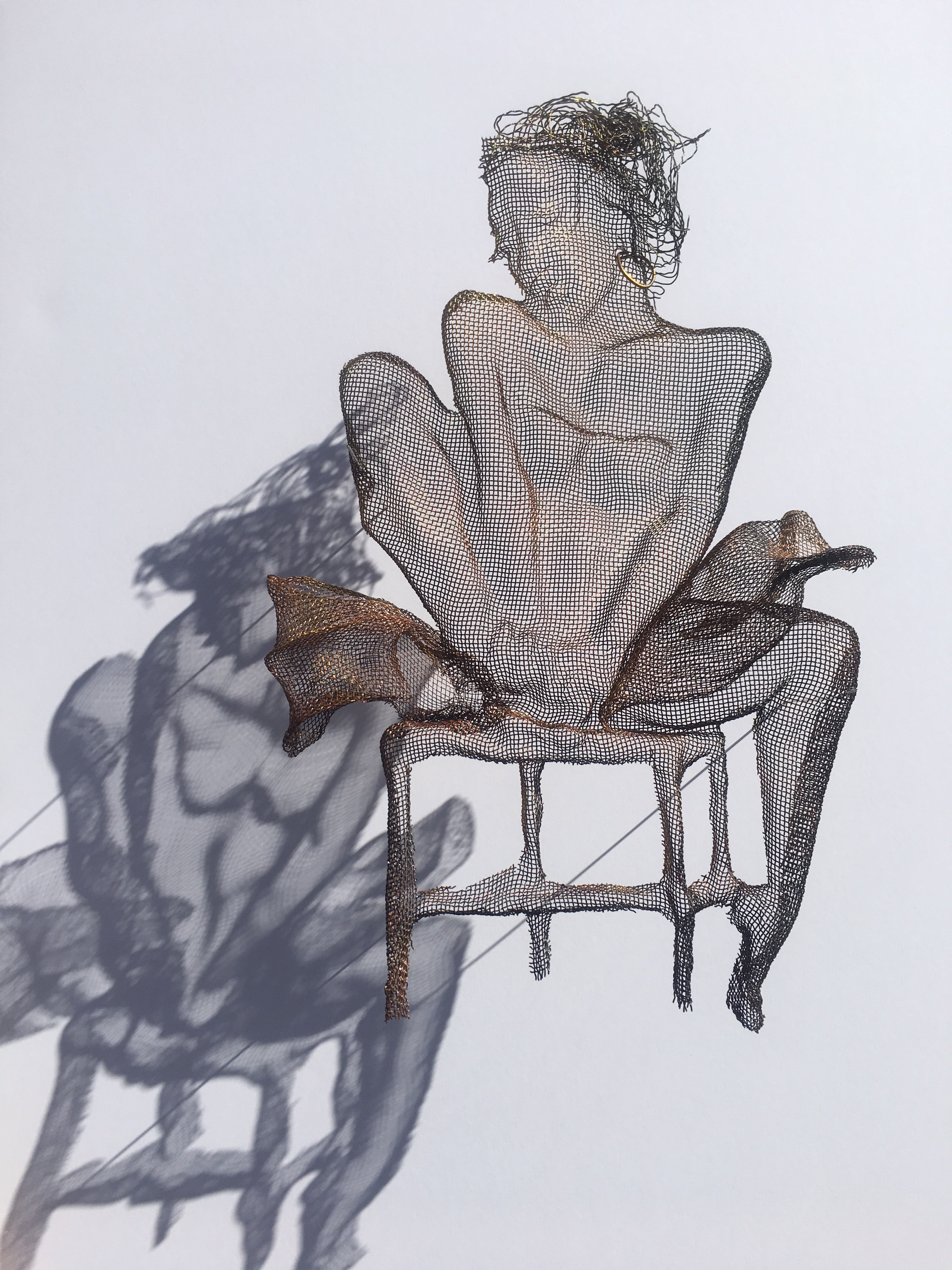 wire mesh sculpture dancers
