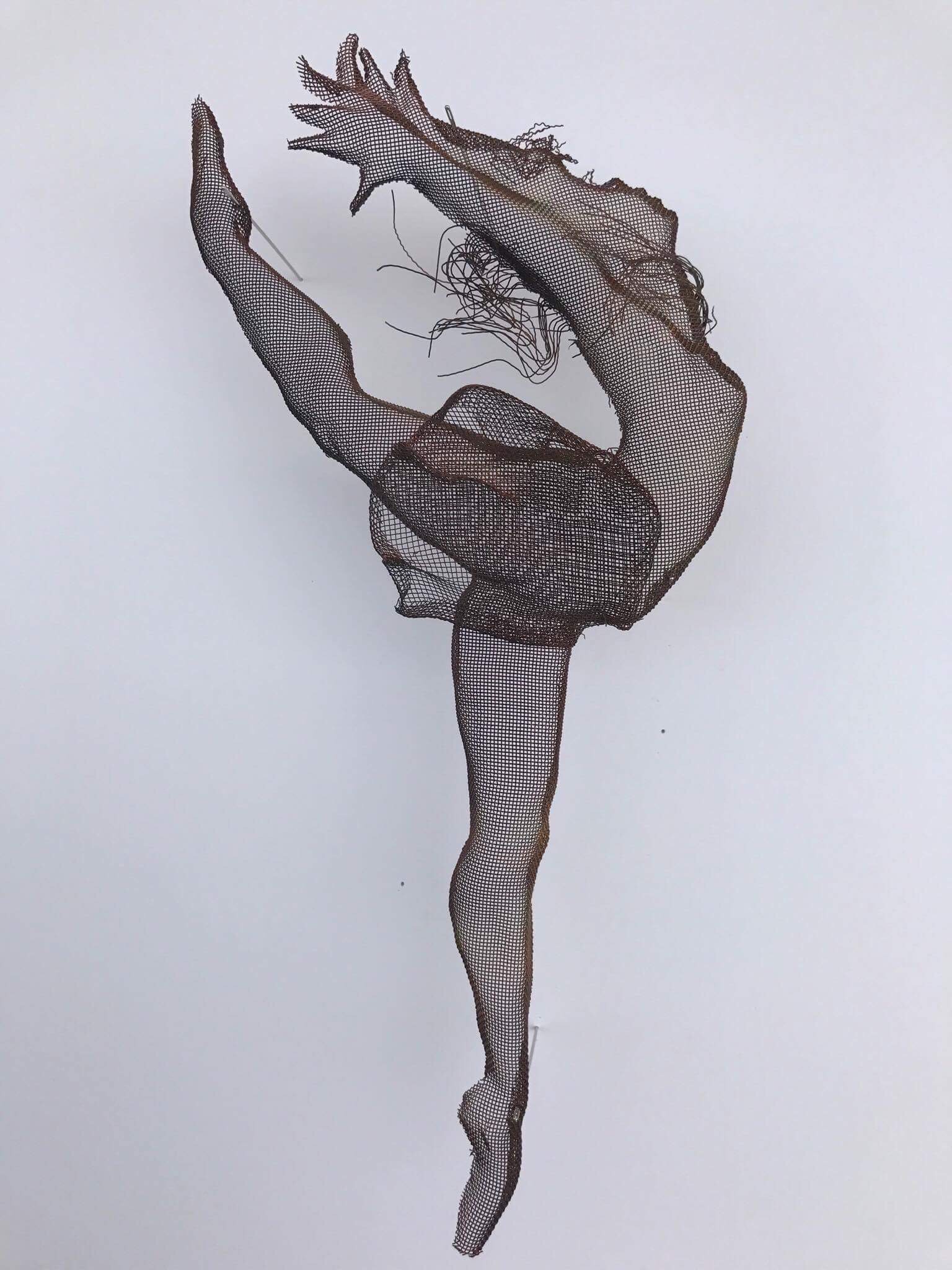 wire mesh sculpture dancers
