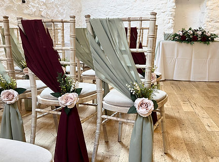 Chiffon chair drape hire for weddings in Devon and Cornwall. Pictured at the Bickley Mill.