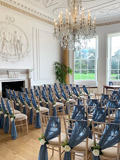 Chiffon chair drape hire for weddings in Devon and Cornwall. Pictured at Rockbeare Manor.