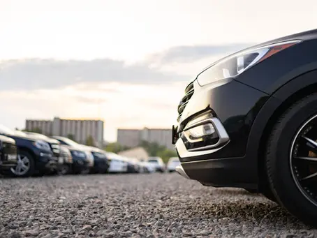 Close-up of a car in a parking lot, showing a convenient Daikin Park parking option for Astros games at 1112 Clay Garage.