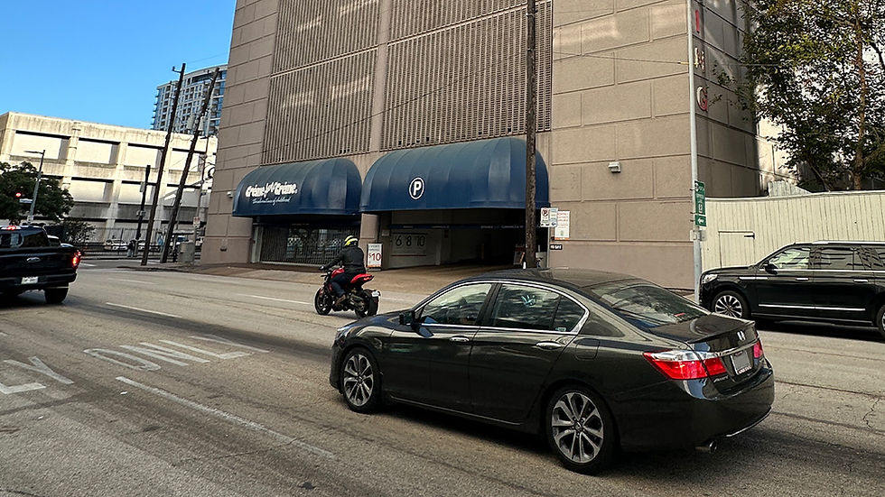 Street view of 1112 Clay Garage entrance in downtown Houston, the perfect stress-free parking spot for your shopping trip.