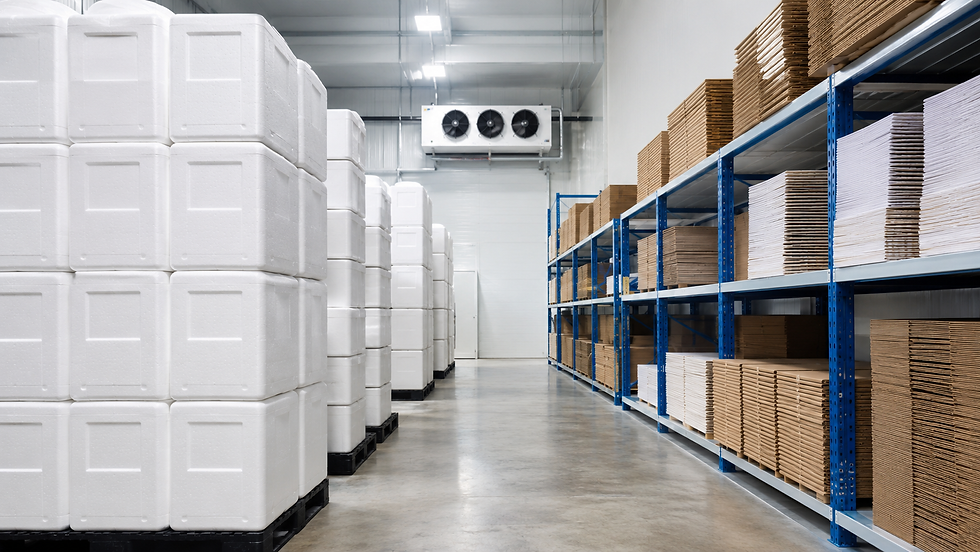 Warehouse comparison showing stacked EPS coolers and flat-packed paper thermal liners.