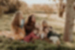 Family in neutral outfits during outdoor family photoshoot by Nicole Peters Photography
