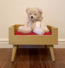 Upcycle wood drawer made into cat bed. Mid Century Modern legs added. Painted goldenrod, Chalk Synthesis Paint by Wise Owl Paint and features a red cushion