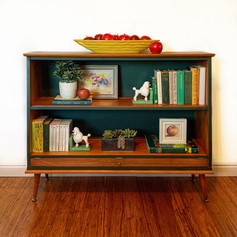 Hutch conversion to standing bookcase. Mid Century Modern legs added and interior painted with Foxtrot Chalk Synthesis Paint by Wise Owl Paint