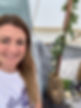 close up of Helen smiling in a treatment space in a bell tent