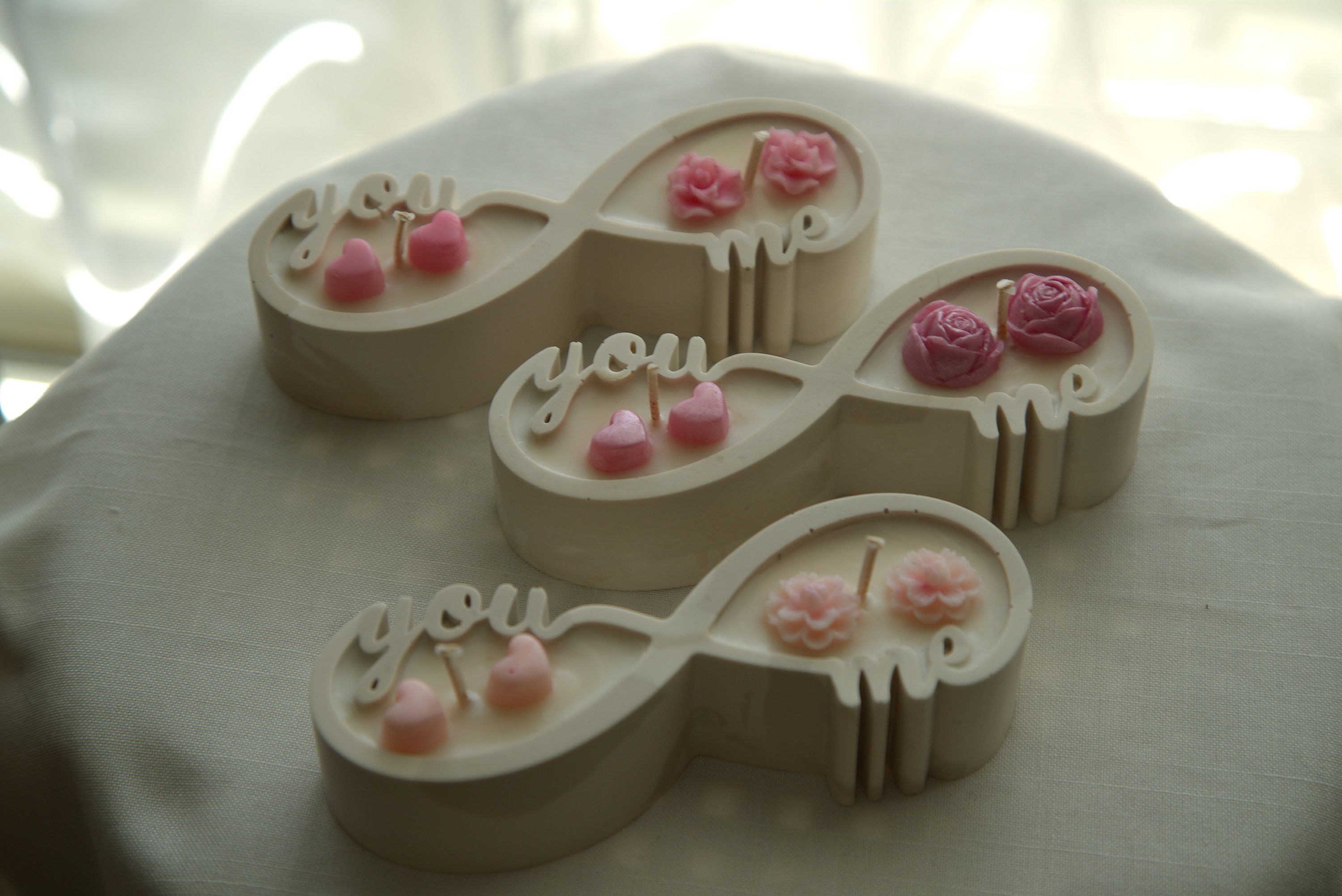  מוצר של נר בג'יסמוניט מעוצבים אינפיניטי