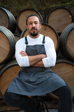 Chef from To Patrikon photographed in the Tsiakkas vineyard for the winery’s culinary partnership campaign.