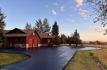 Quality asphalt seal coating and paving service offering a smooth and hard-wearing surface intended for durability and a prof