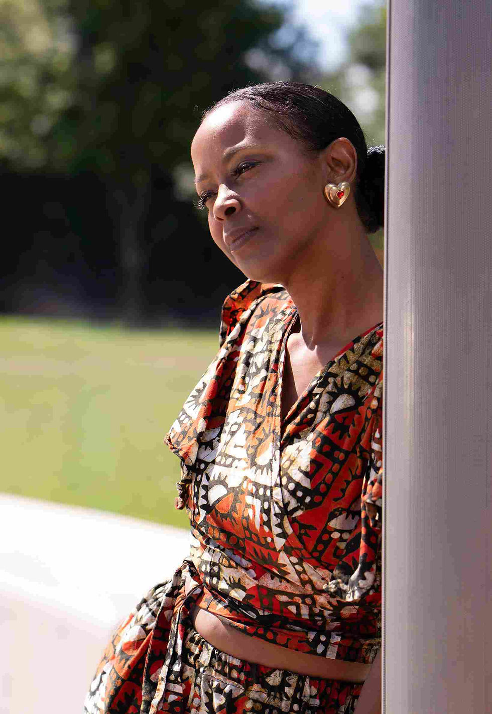 Kimani Haley, professional publisher and book editor, posing with 'good posture' to represent resilience and authority.