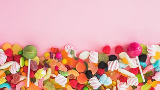 Sweets_Lollipop_Candy_Marmalade_Colored_background_555251_2560x1440_edited.jpg