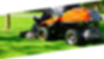 a close up photo of an orange commercial riding lawn mower cutting grass, the foot of the operator of the mower can be seen