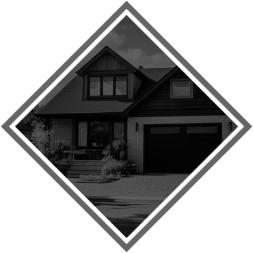 diamond shaped, black and white photo of the front of a modern home