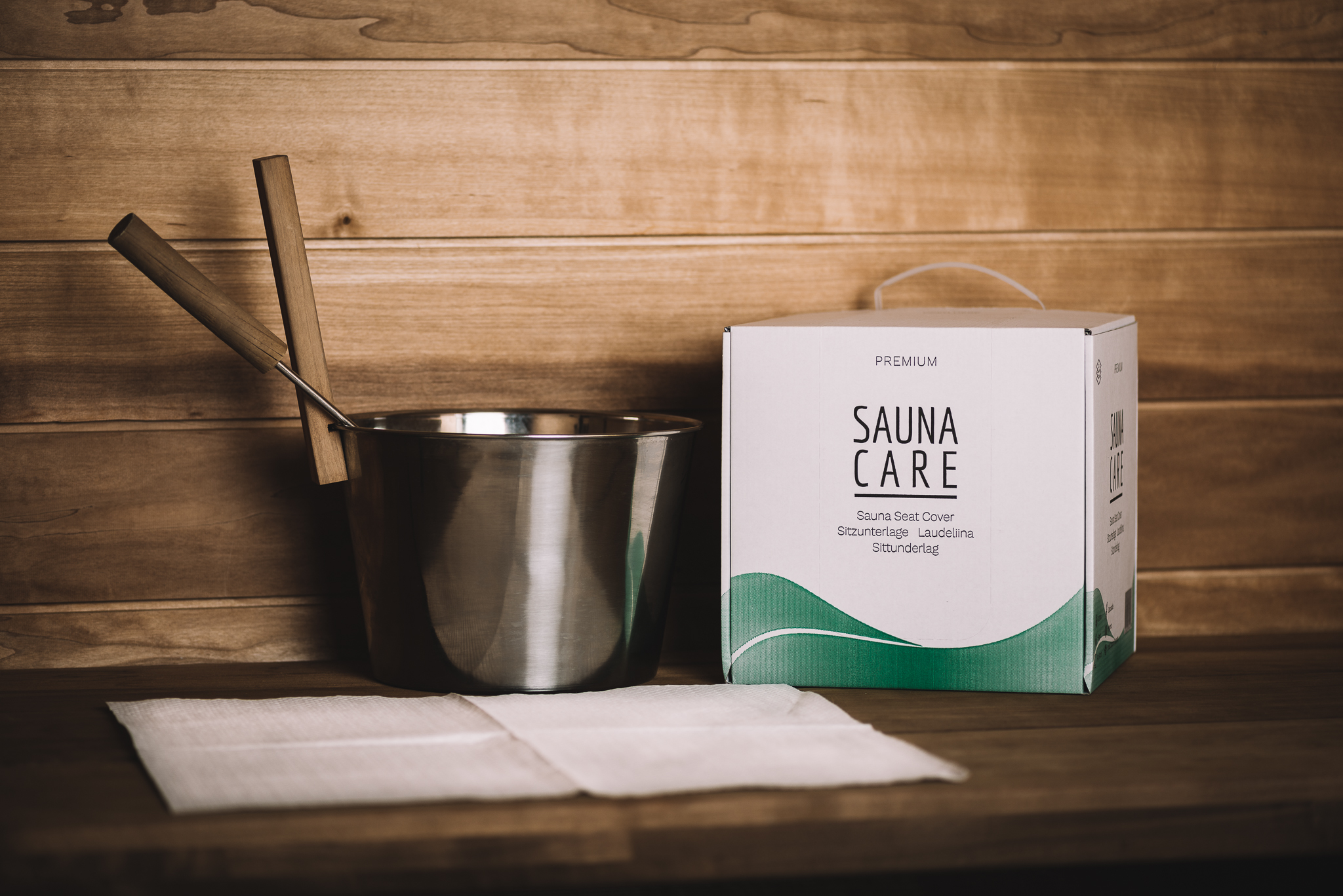 SaunaCare disposable sauna bench cover and packaging