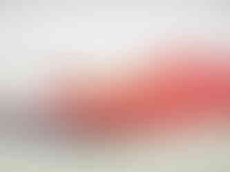 Close-up of the threads holding up the match of the Floating Match on Card trick