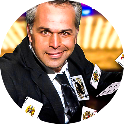Magician Joe Holiday springing playing cards from his hands
