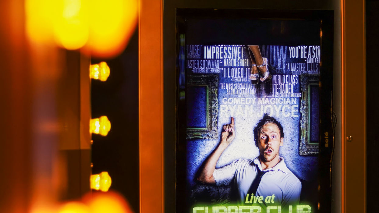 A promotional poster of Ryan Joyce featuring text for Penn & Teller: Fool Us, highlighting his television and media credentials.