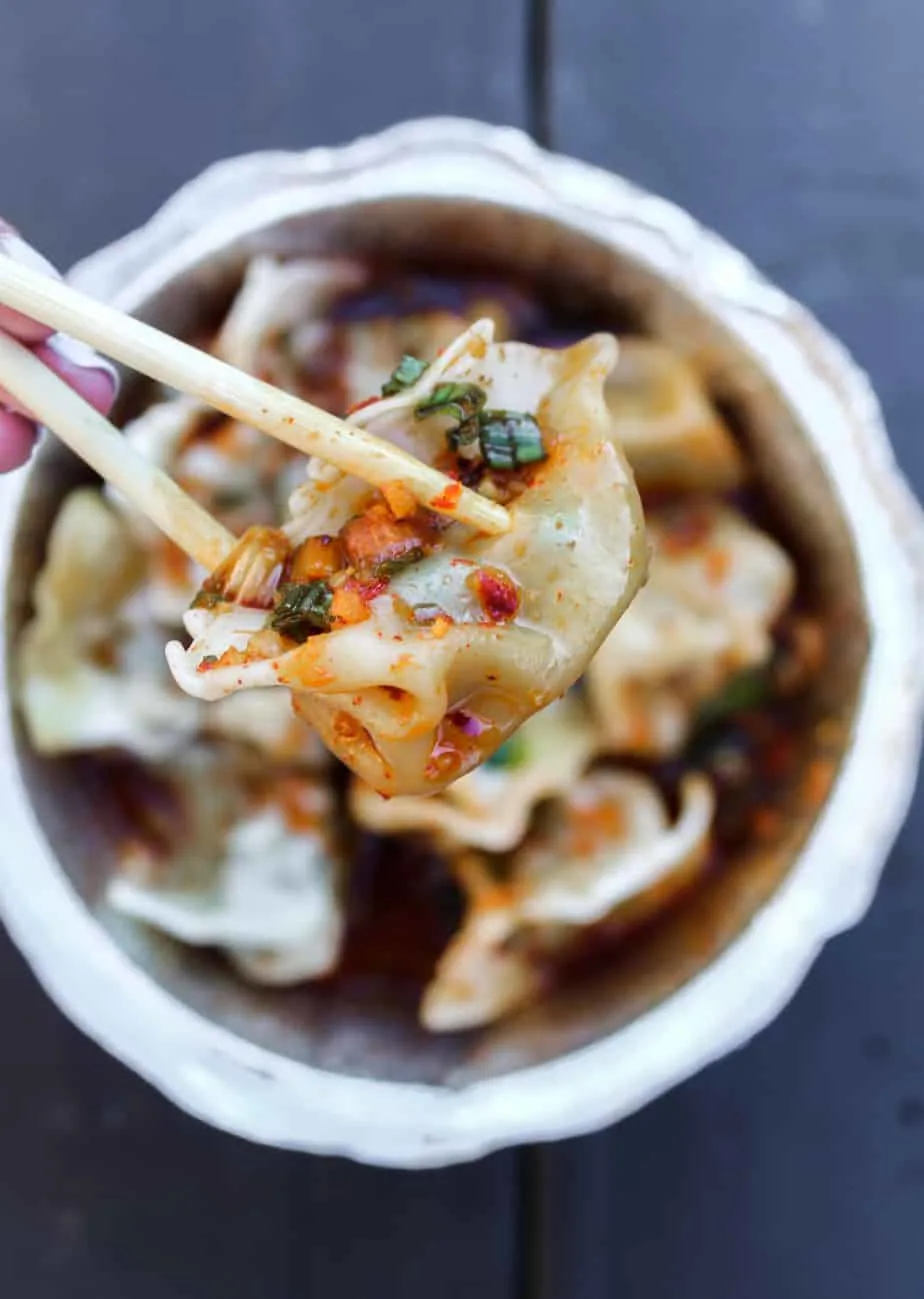 the-dumpling-lady-eating-a-dumpling.jpg.webp
