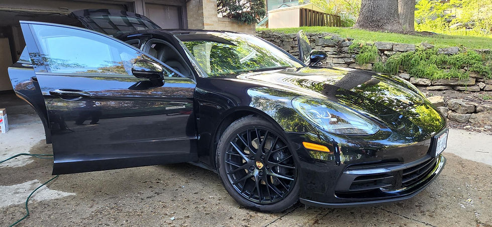 Black Porsche being detailed at home thanks to Rabuck Detailing Mobile