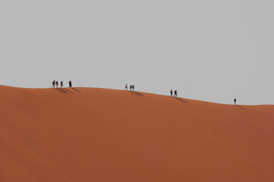 People walking on a desert