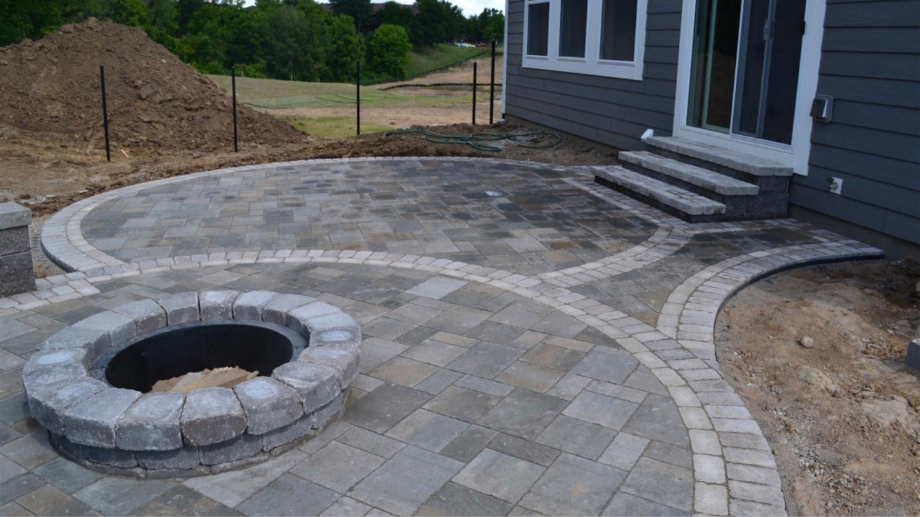 Granite Steps With Fire Pit And Curved Custom Cut Brick Paver Patio