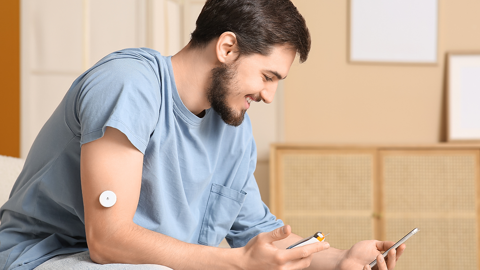 A person with diabetes wearing a continuous glucose monitor (CGM).