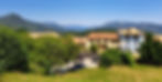 Via Rinaldi at the top of picturesk town Artò with mountain views