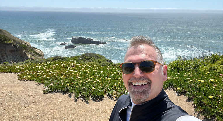 Bill selfie next to the ocean