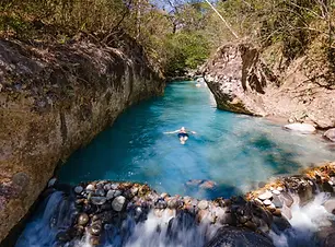 Horseback-Riding-to-Las-Chorreras-Waterfall-Blue-River-Ponds-image-3.webp