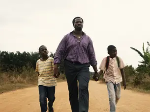 Characters walking in 'My Father's Shadow'