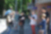 Tour guide leading a small group around the neighborhood